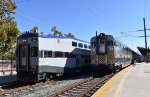 The first outbound Coaster Train of the day awaiting departure from San Jose Diridon Station while an Amtrak Capitol Corridor train awaits its assignment